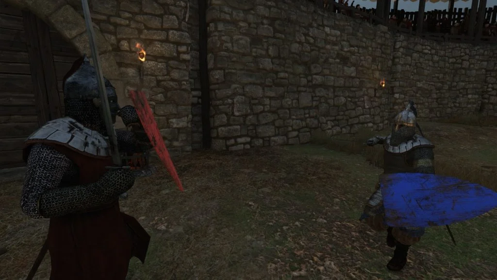 Mount & Blade 2 Bannerlord screenshot of two knights fighting in an arena as one is thrusting a sword forward.