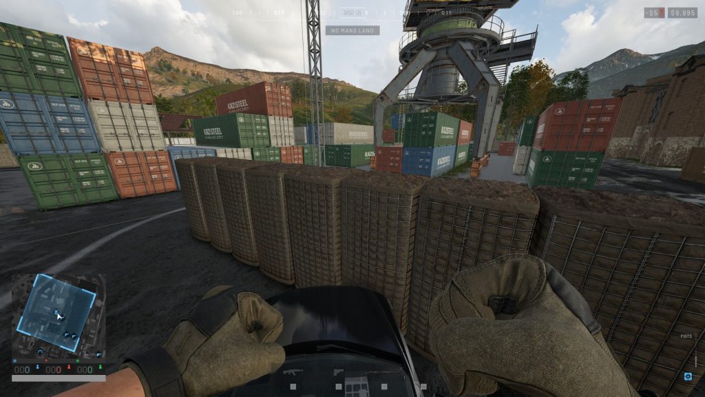 Wardogs Climbing Car Next to Hesco Cube Wall